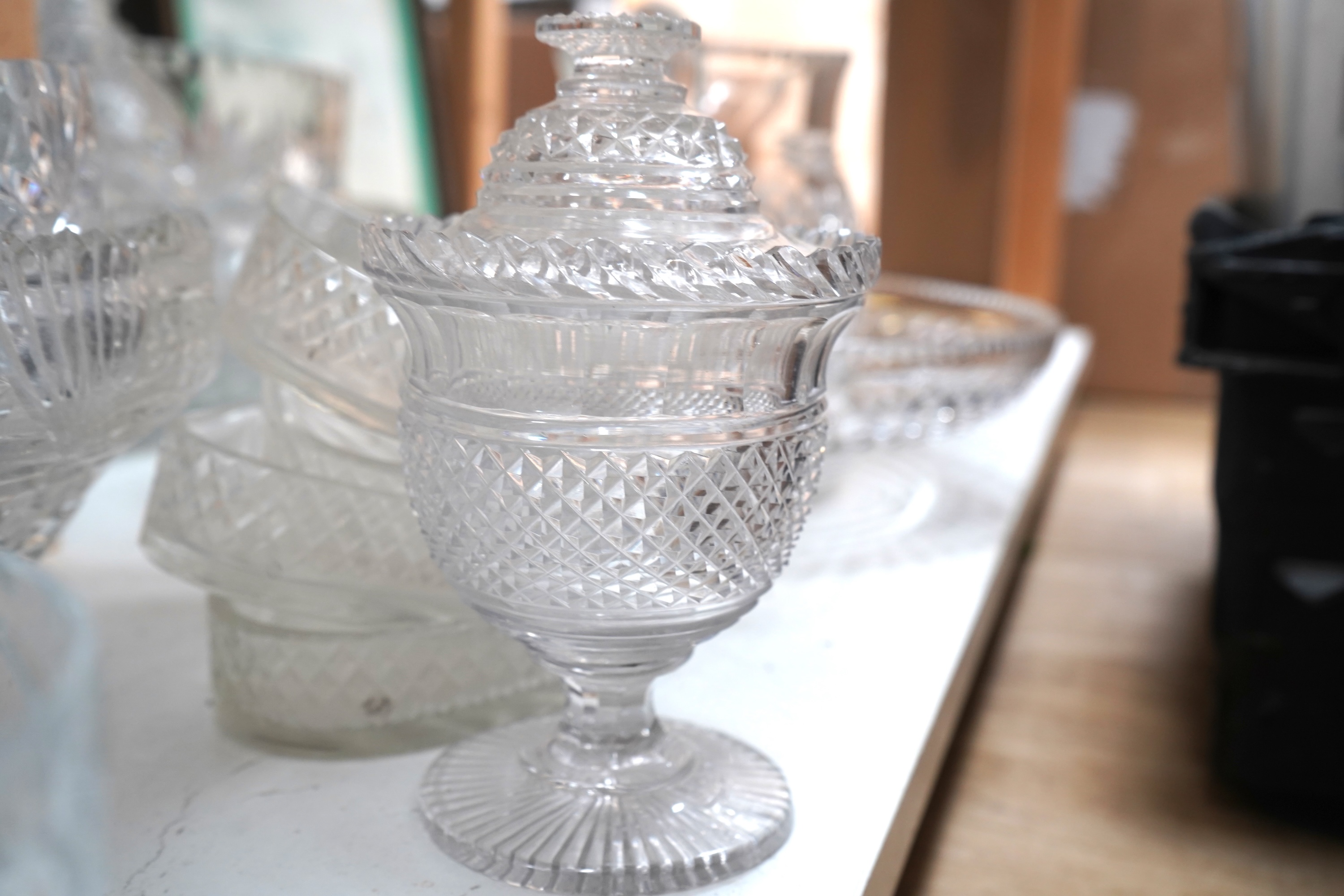 A collection of various cut glass